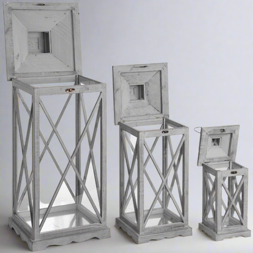 Set Of Three Wooden Lanterns With Traditional Cross Section