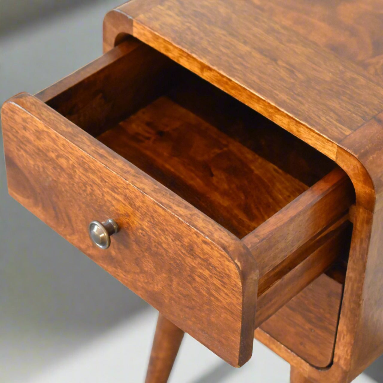 Compact mango wood bedside table