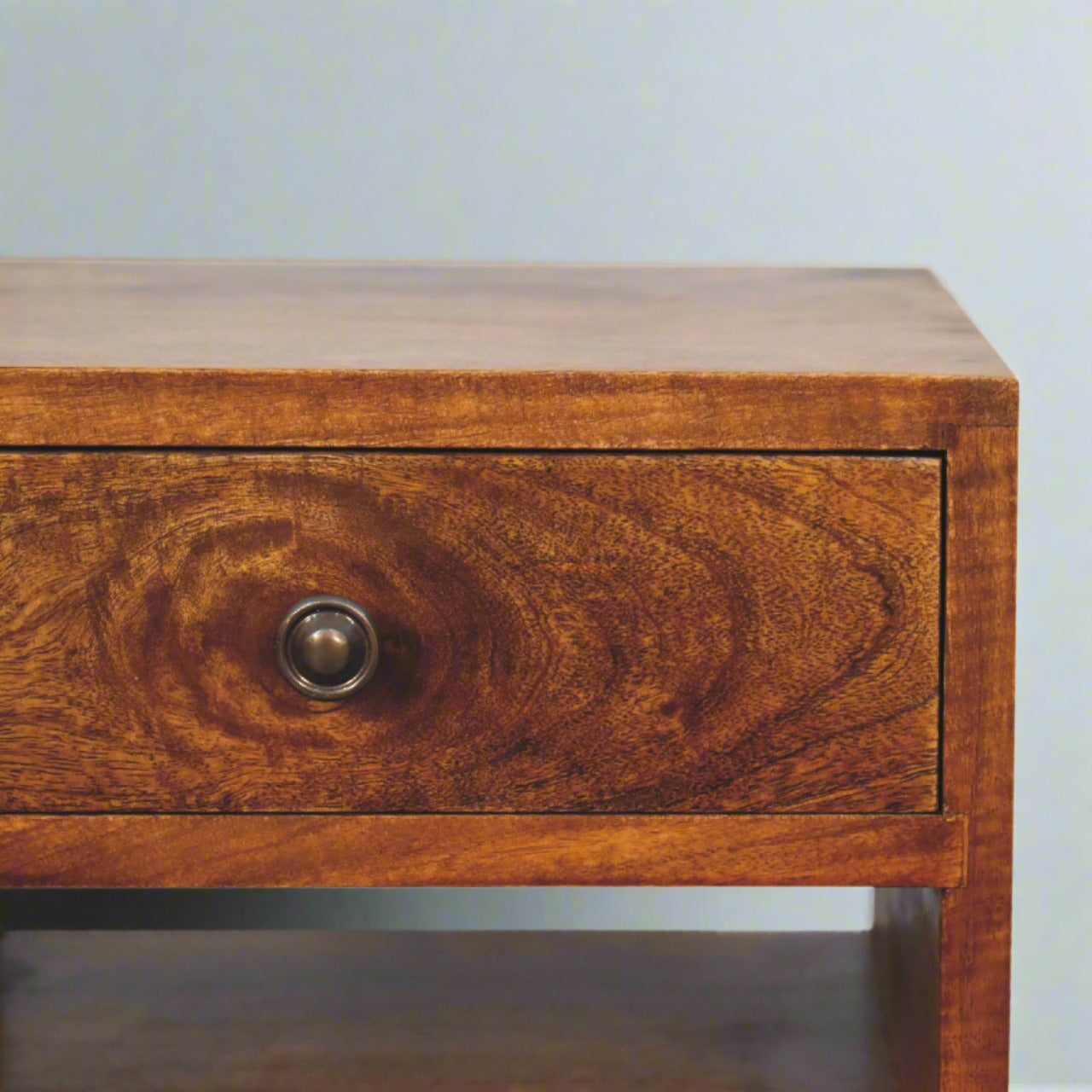 Bedside table with brass knobs