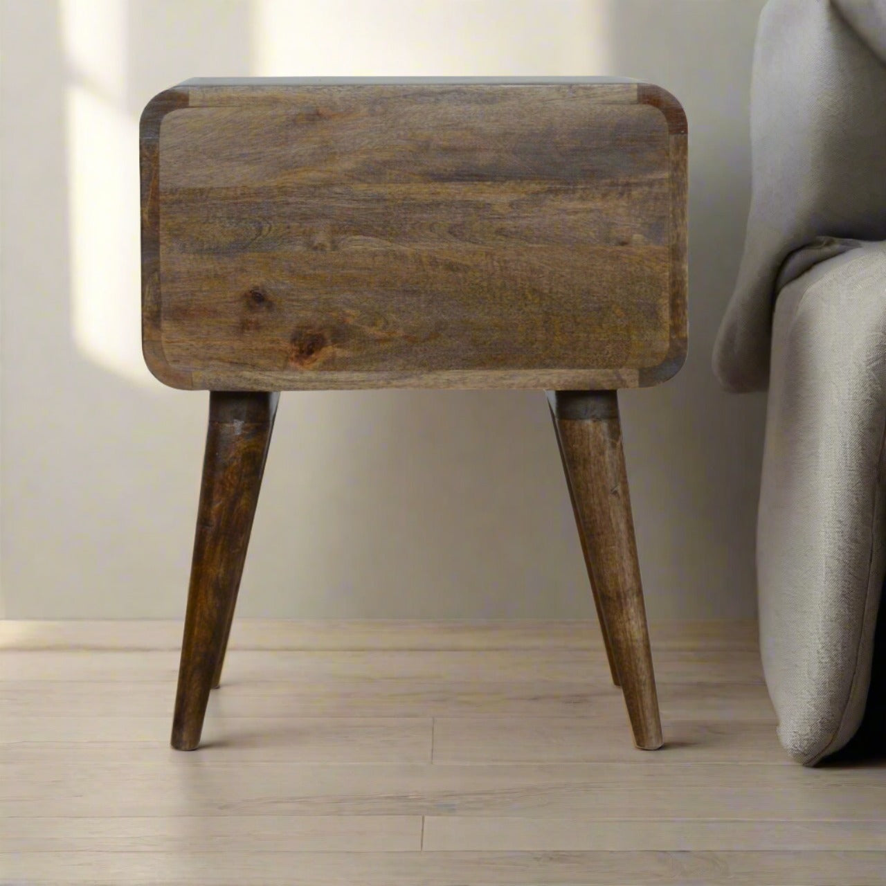 Bedside table with curved edges