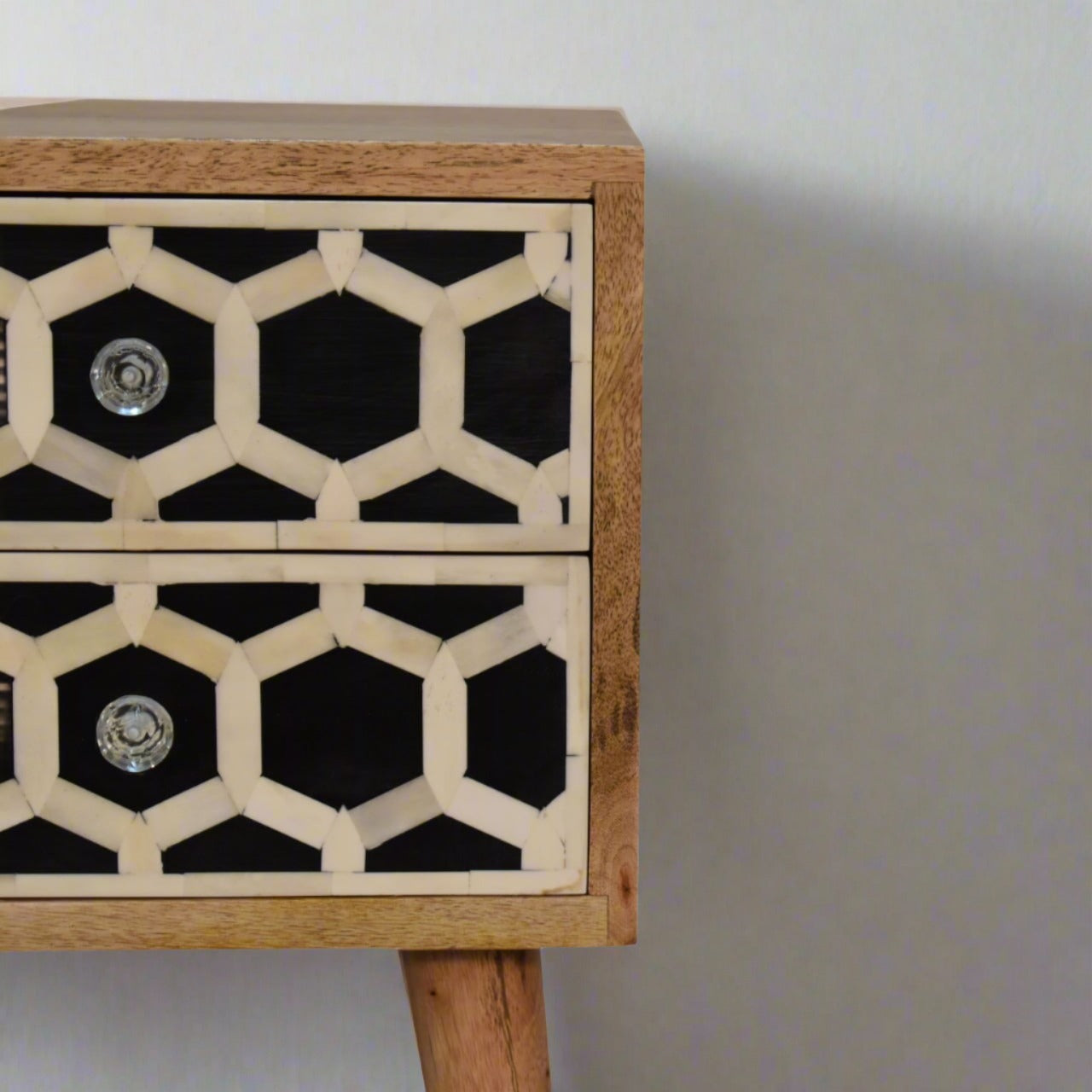 Stylish bedside table with drawers